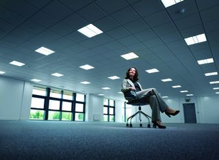 woman alone in empty office